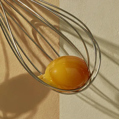 Wall art: Whisk with egg yolk